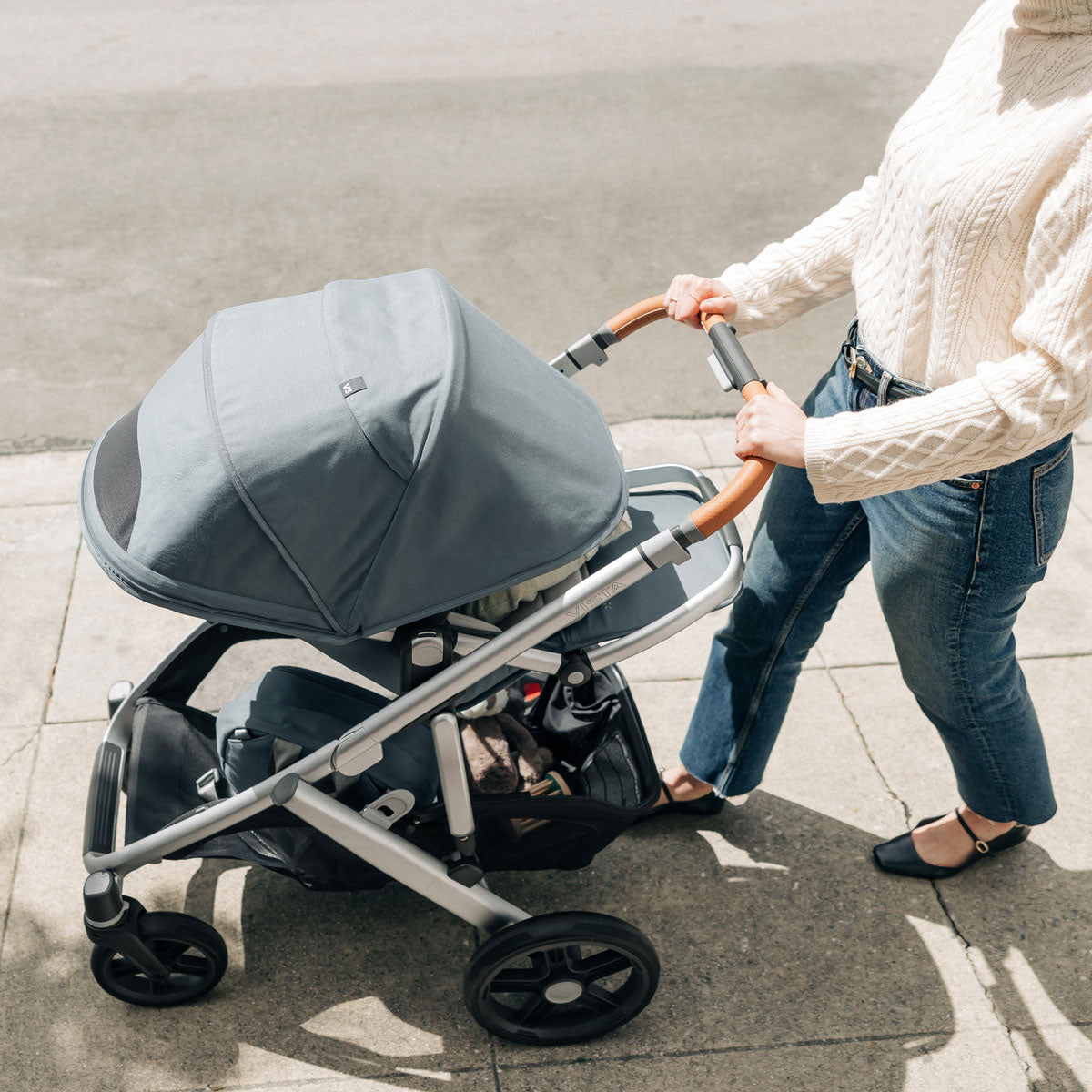 Woman pushes baby in UPPAbaby VISTA V3 Stroller - CALLUM (Stone Blue)