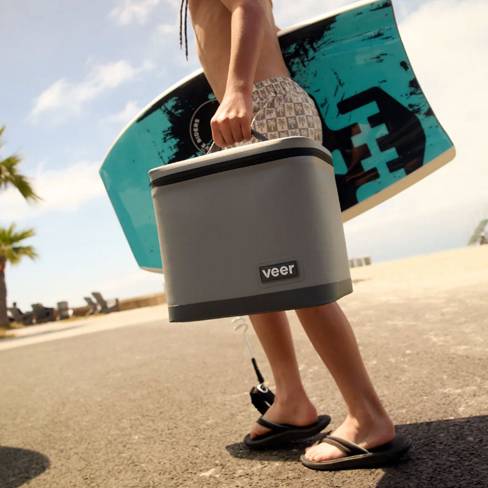 Boy carries Veer Lunch Cooler - Gray Granite