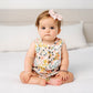 Little girl wears Lou Lou and Company Cloud Muslin Heirloom Bow Headband - Blush