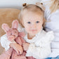 Little girl holds Saranoni Stuffed Animal Lovey - Bunny